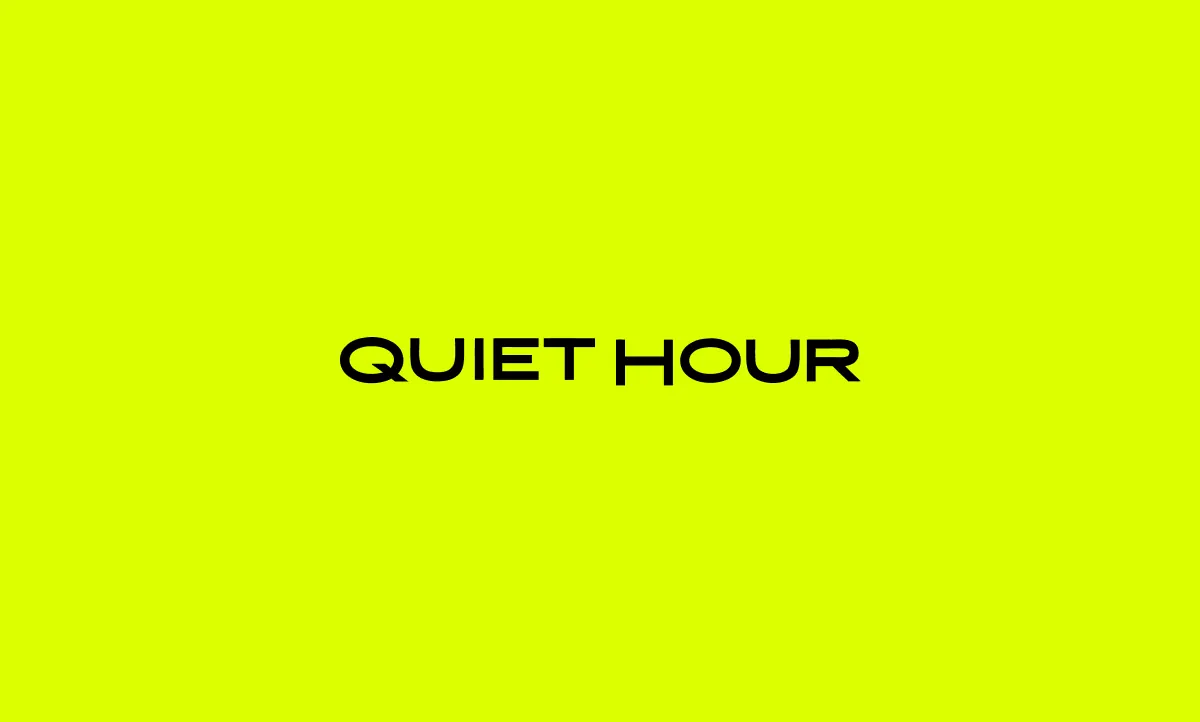 QUIET HOUR — brand title card in black type on a vivid yellow-green background