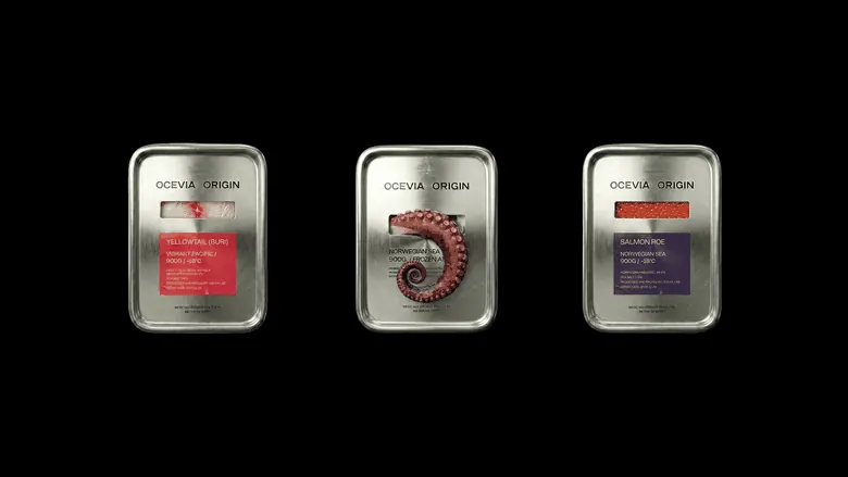 OCEVIA ORIGIN premium seafood packaging tins for yellowtail, octopus, and salmon roe, displayed on a black background
